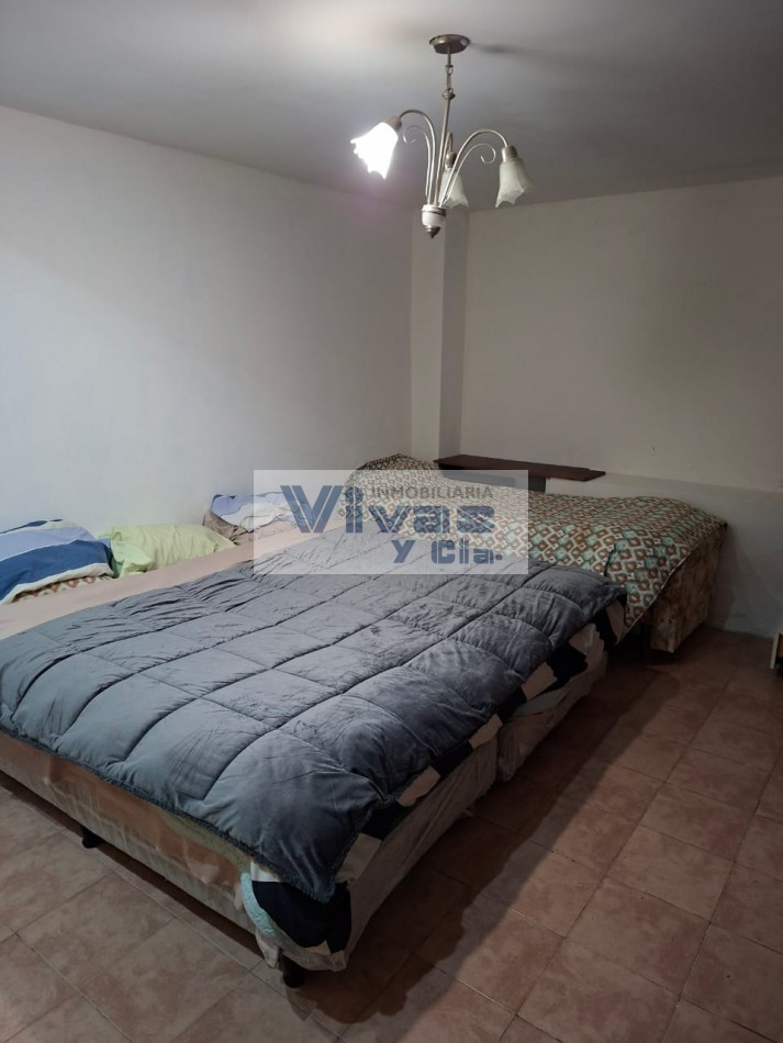 CHALET 3 AMBIENTES CON GARAGE Y QUINCHO